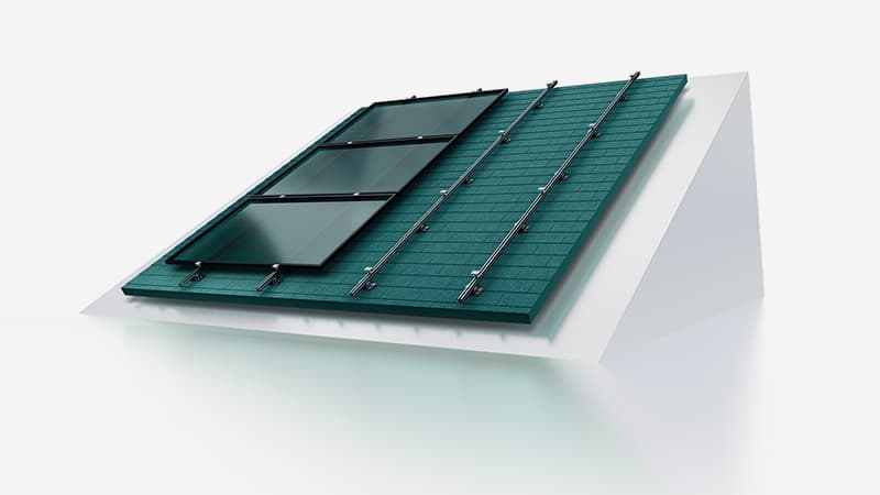 A model of a slanted roof with three solar panels installed on the left side and green shingles on the right side against a plain white background.