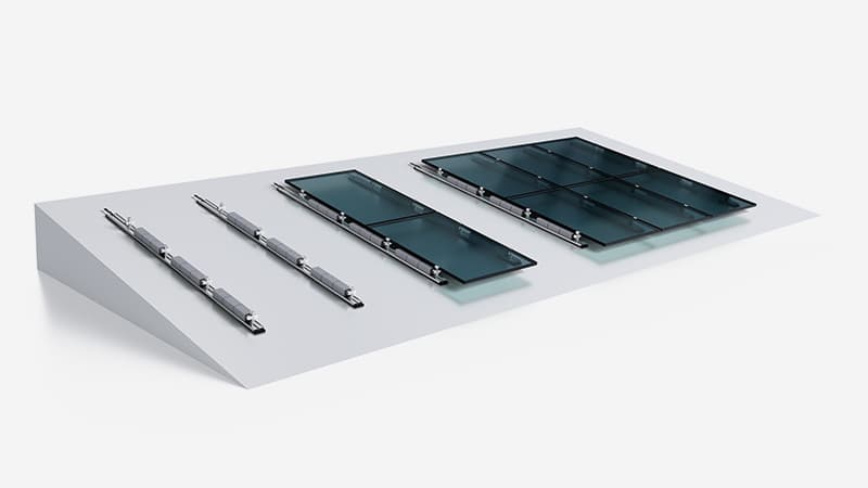Image of a display showing components for mounting solar panels on a pitched roof, including rails, fasteners, and several arranged solar panels.