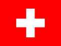 The flag of Switzerland, with a white cross centered on a red background.