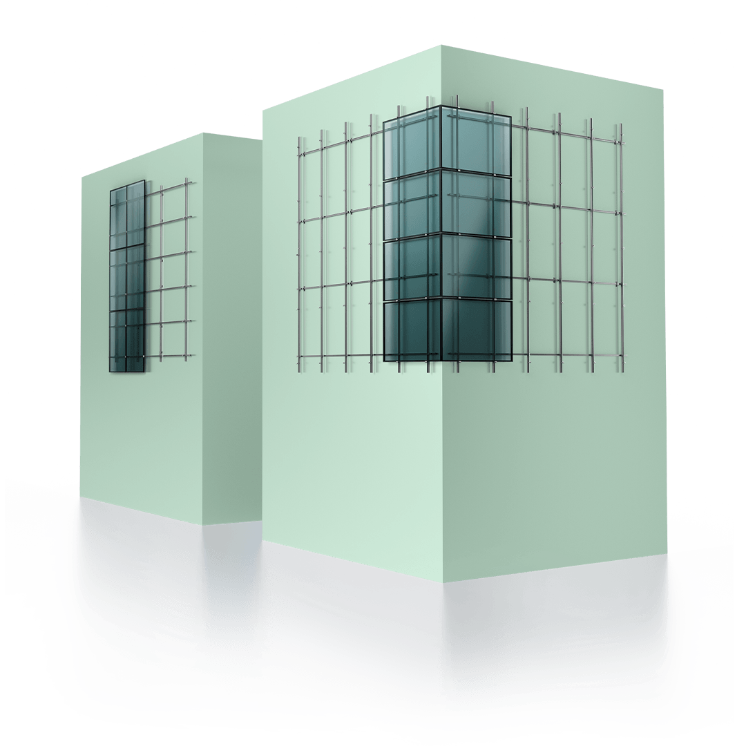 Two modern light green buildings with large glass windows and gridded metal frames, standing on a reflective surface.