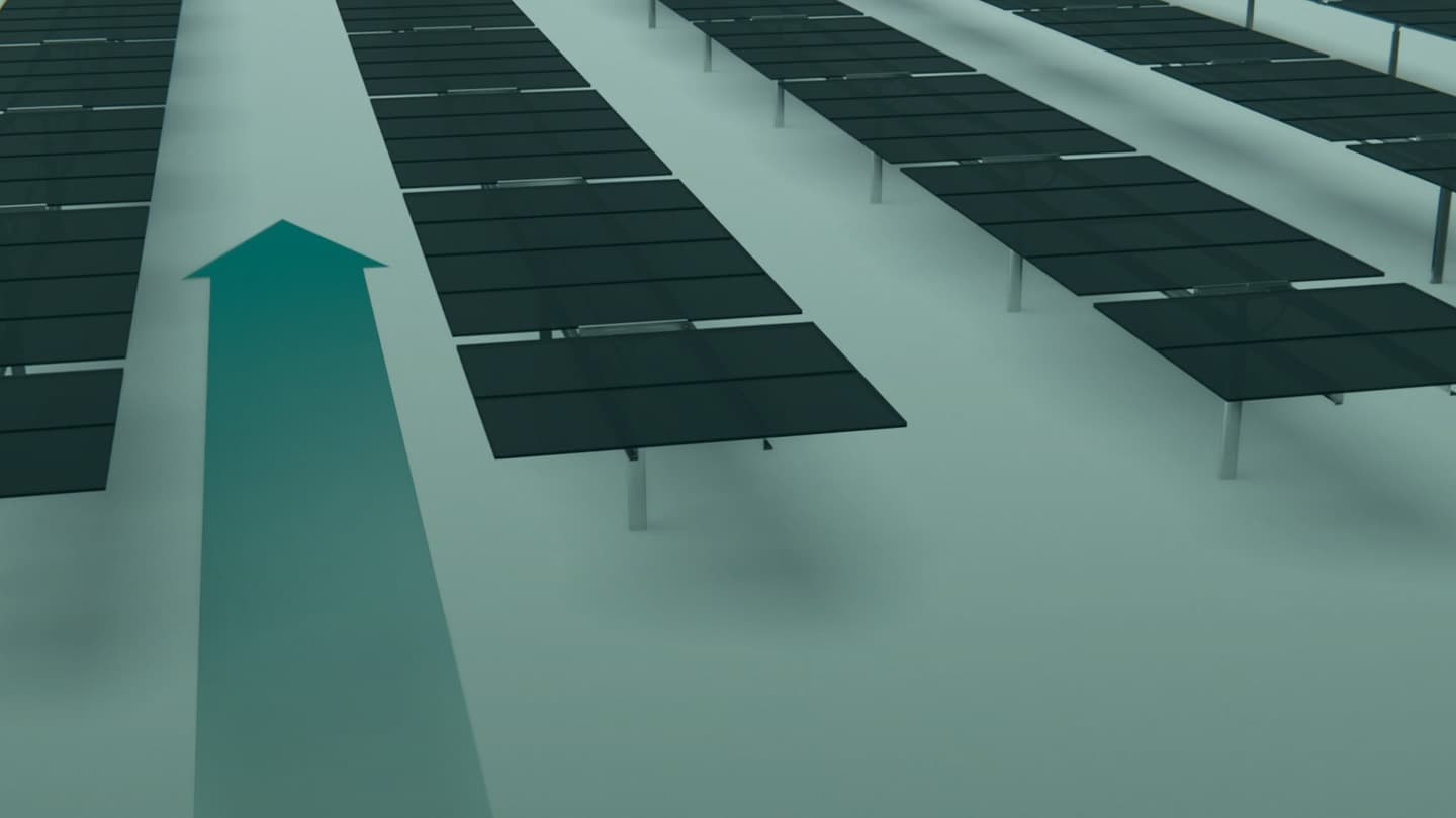 Rows of solar panels are arranged in parallel lines with a large green arrow pointing forward overlaid on the image.
